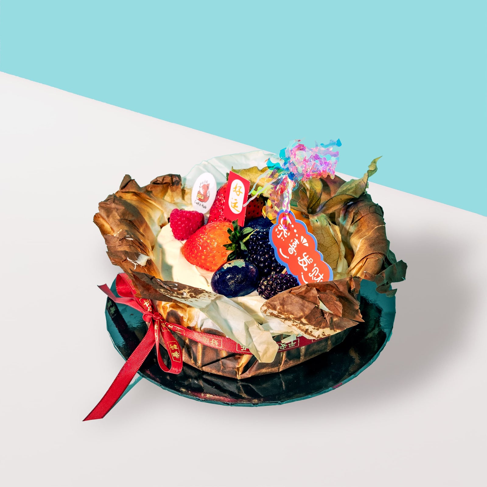 Festive Basque Cheesecake cake_cny2026 Cake Hub - CakeRush