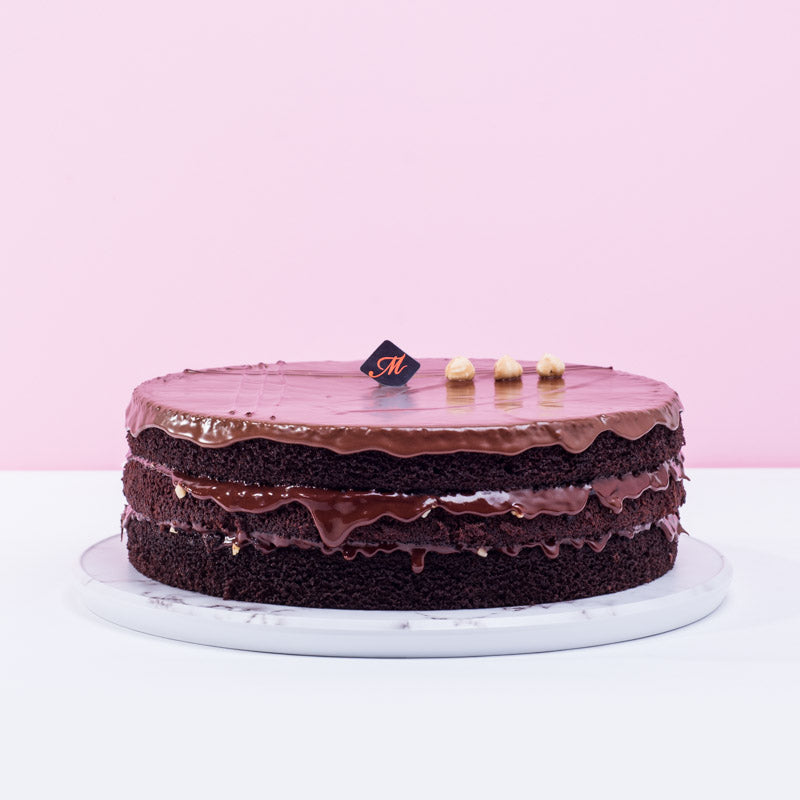 Signature Crunchy Nutella Cake cake Madeleine Patisserie - CakeRush